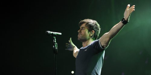 Enrique Iglesias performs during the KIIS-FM Jingle Ball concert at Staples Center, on Friday, Dec. 6, 2013, in Los Angeles. (Photo by Chris Pizzello/Invision/AP)