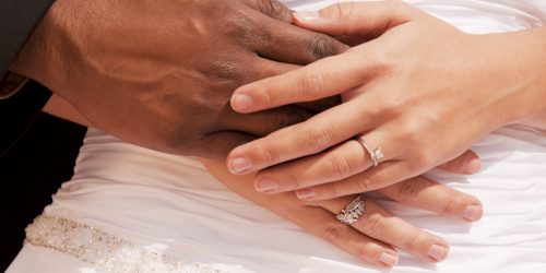 Multi Ethnic Bride and Groom Holding Hands