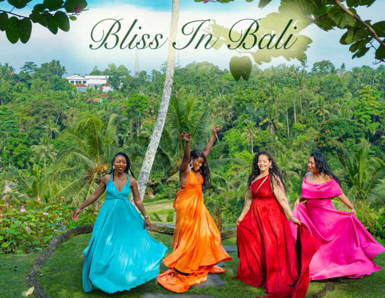 Stephanie Blake and girlfriends spinning in colorful gowns on the heart-shaped lawn at Swing Heaven Bali with the Ayung River valley in the background