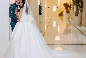 Jasmine Styles and Maxwell Pearce in their wedding attire at Signia by Hilton Orlando