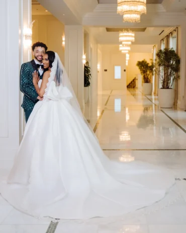Jasmine Styles and Maxwell Pearce in their wedding attire at Signia by Hilton Orlando