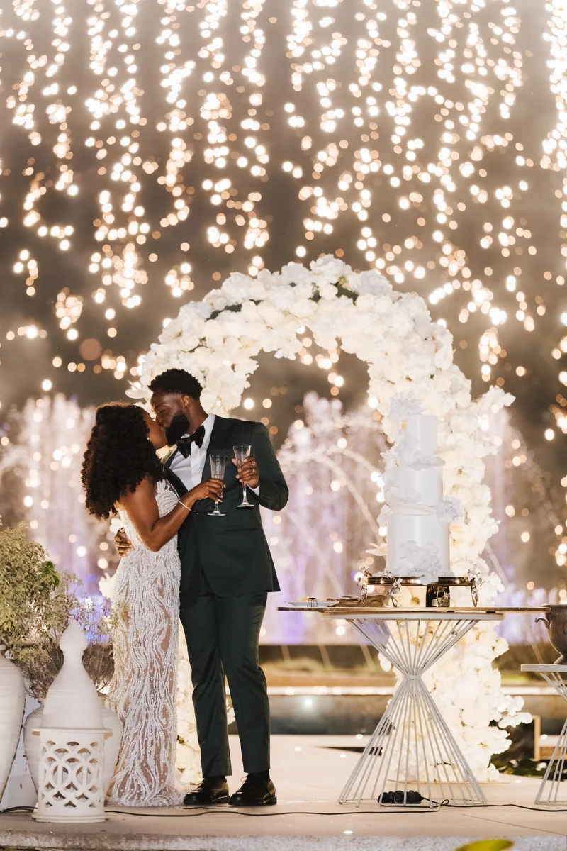 Jovan and Jalin sharing their first dance beneath sparklers