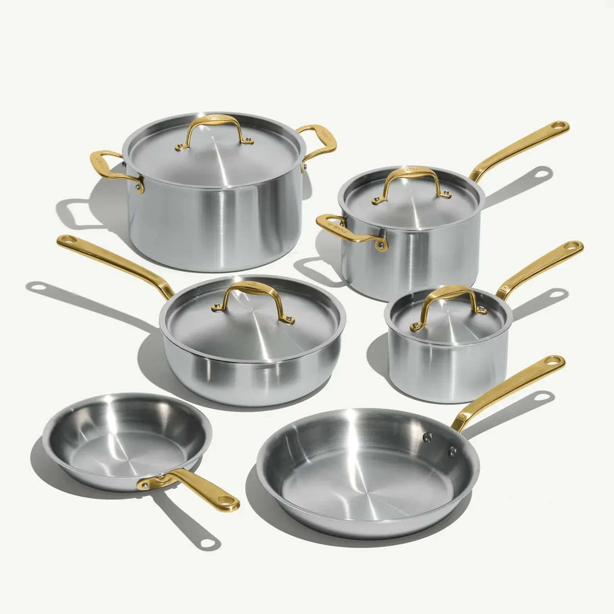 Made In stainless steel cookware with antique brass handles