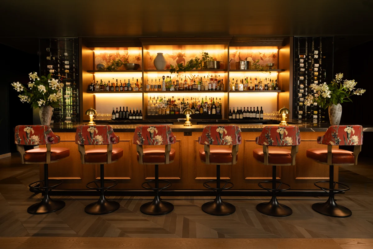 The warmly lit bar at Ninety Acres