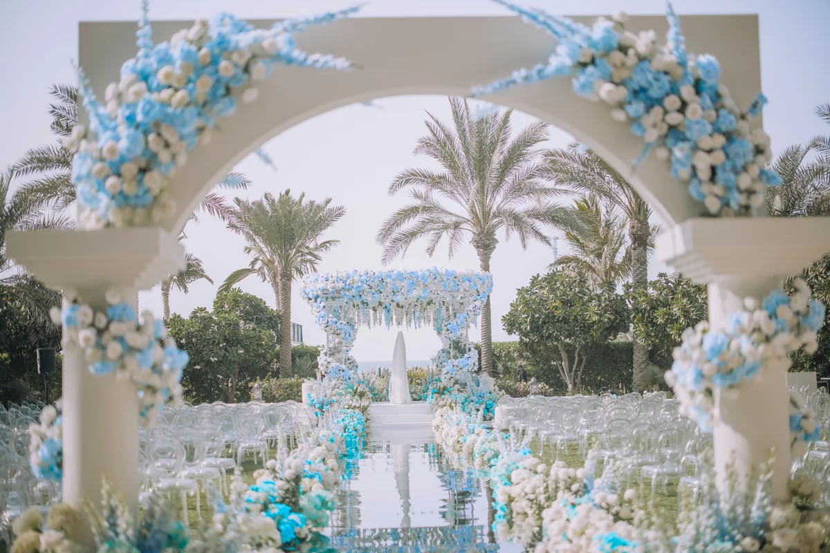 Blue and white floral arch for Shifa and Shahzeb’s wedding