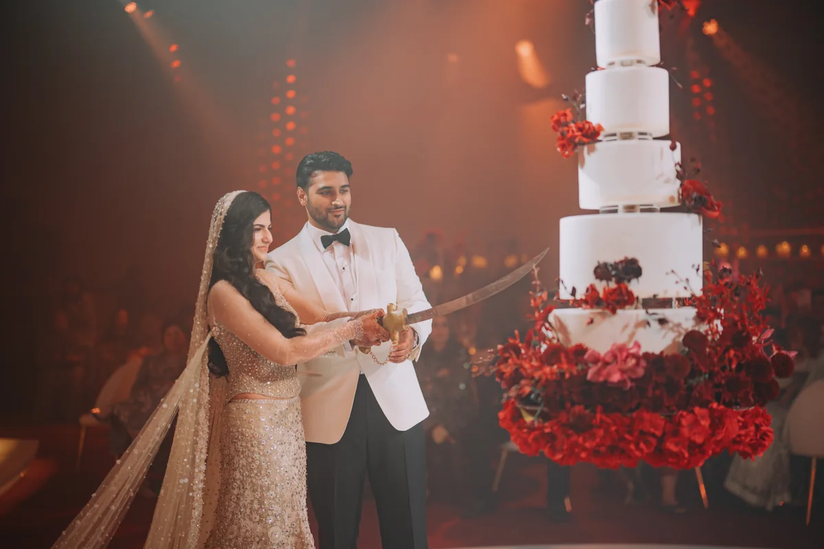 Shifa and Shahzeb cutting their wedding cake