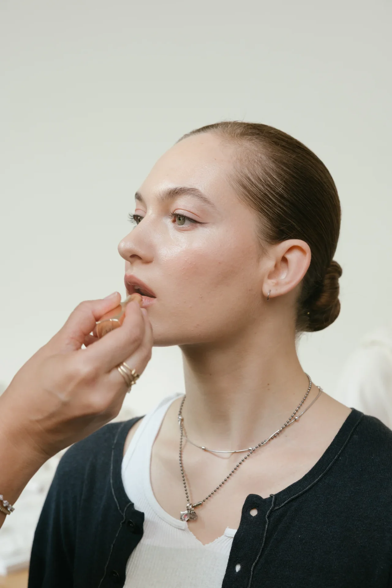 Close crop of the soft, glowing bridal makeup look