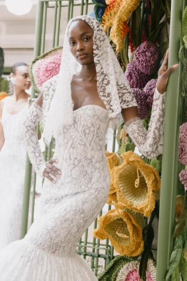 Francesca Miranda Floresta Fall 2027 bridal look amid Chelsea floral installation