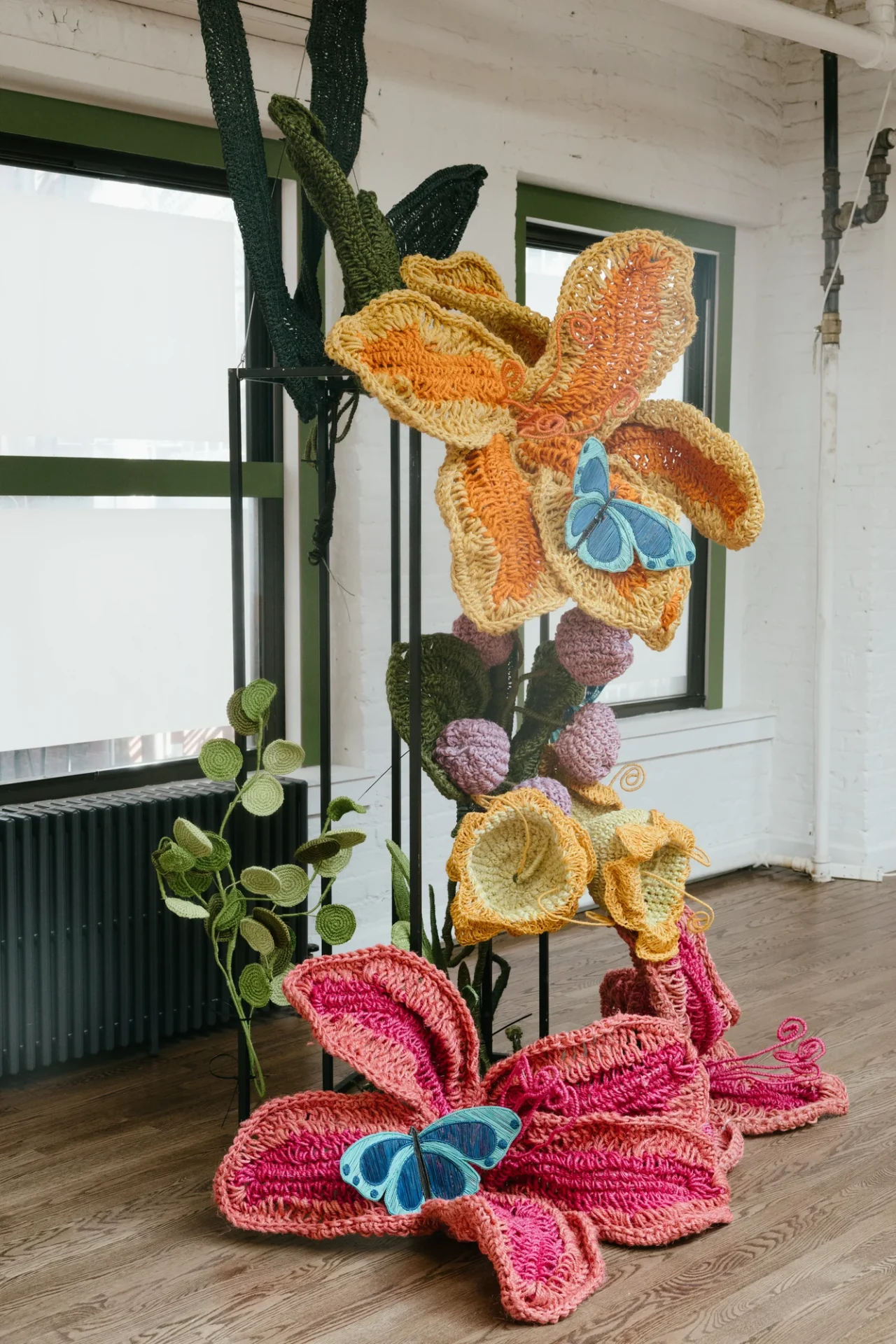 Handwoven flowers from the Floresta installation